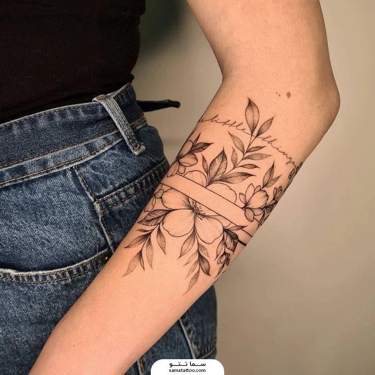 تتو مشکی برگ و گل روی دست