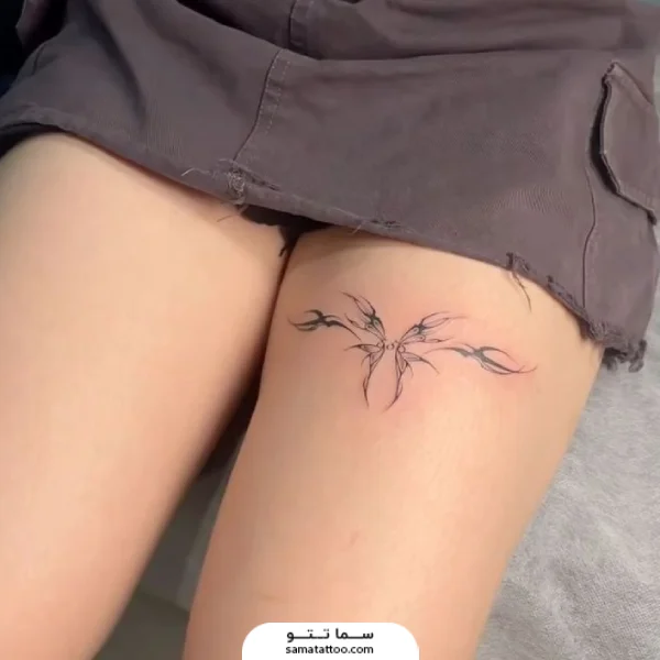 تاتو پروانه روی ران پا